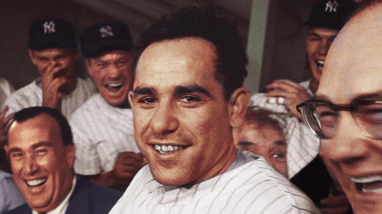 a group of men smiling at the camera